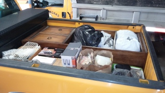 The back of a Hellertown public works pickup truck is loaded with donated household items destined for the Lehigh Valley Outreach Depot and local families in need.