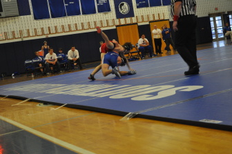 Saucon's Dylan Yonney puts in a whizzer to fight off Anthony Colasurdo's takedown attempt at 145.
