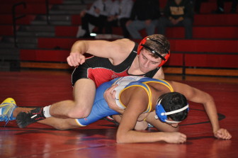 Nate Harka of Saucon Valley rides his way to a pin.