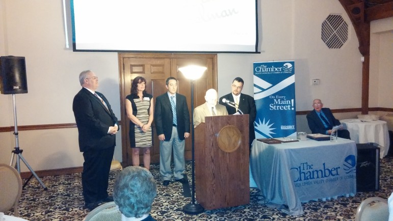 Community Commitment Award recipient David Heintzelman receives a recognition from Hellertown borough officials, including Mayor Richard Fluck (at podium), borough manager Cathy Hartranft, councilman Joe Pampanin and council president Tom Rieger.