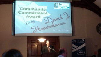 David Heintzelman accepts the Hellertown-Lower Saucon Chamber of Commerce's 2015 Community Commitment Award at a banquet at Silver Creek Country Club.