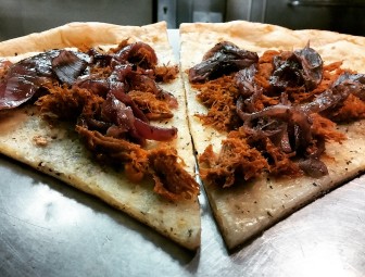 Cafe Erica's new Pulled Pork gourmet white pizza is quickly becoming a customer favorite.