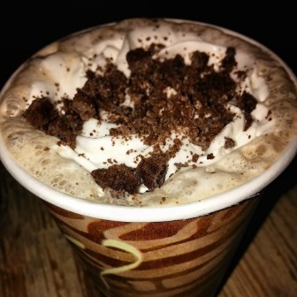 A Caffe Mint a la Mocha topped with crushed chocolate mint cookies is a specialty coffee drink served at Cafe Erica in Hellertown.