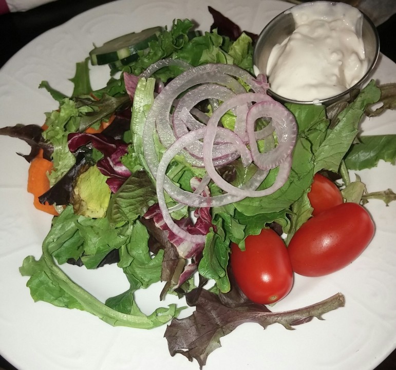 Braveheart's house salad features mixed greens with vegetable accompaniments served with a choice of dressing.