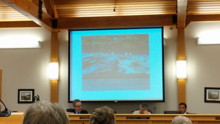 A photograph of the section of the Narrows (Riverside Drive) in Lower Saucon Township that has been undermined is projected at township council's June 17, 2015 meeting.