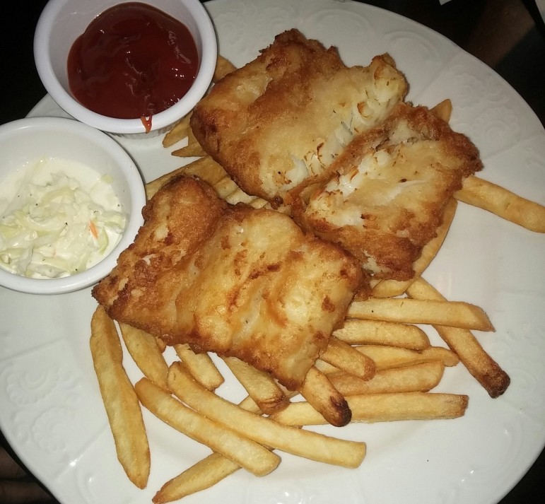 Traditional Scottish favorites like fish and chips can be ordered from Braveheart Highland Pub using the restaurant's takeout app. Listed under Scottish Fare on the app menu, it features tender cod filets fried in a crispy beer batter and served with cole slaw, french fries and tartar sauce (pictured substitution: ketchup).