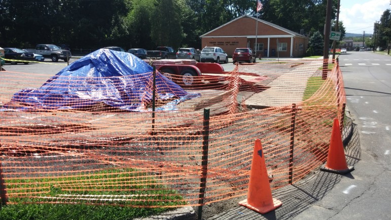 A new ADA-compliant ramp is installed at the corner of Rentzheimer Drive and Water Street near the post office in Hellertown in August 2015.