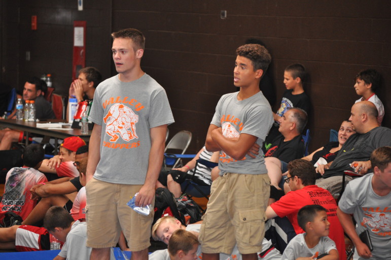 Coaches Jason Jones and Paul Miller in action at the Olympic Duals