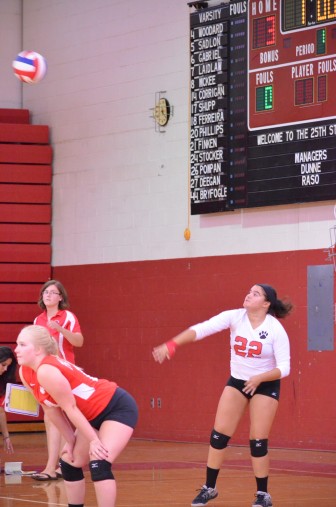 Lady-Panther Nicole Martins completes a serve.