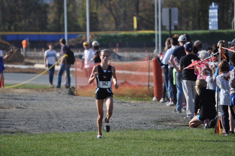 Kiele Riefenstahl of Saucon Valley finishes first overall at the 2015 Colonial League Girls Cross Country Championship