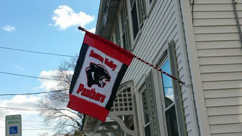 Linda Snyder VanVliet shows off her Panther Pride with a Saucon Valley Panthers flag.