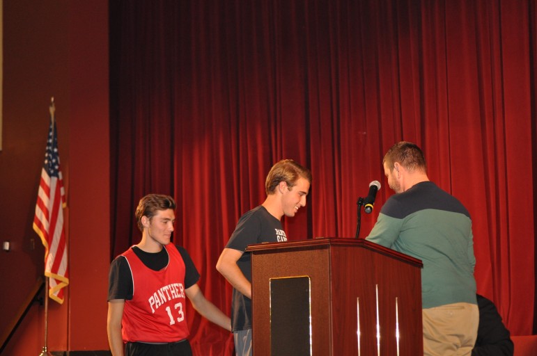 Soccer Coach Mel Moyer recognizes his Outstanding Seniors Sean and patrick Cyphers