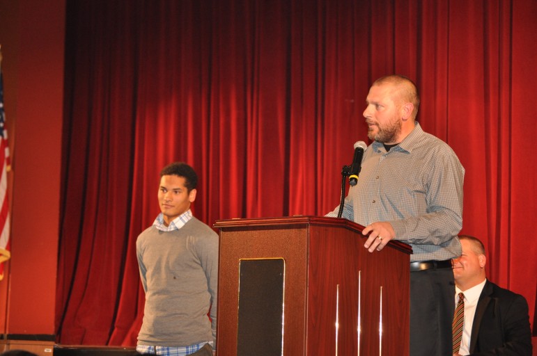 Football Coach Matt Evancho introducing team MVP Evan Culver