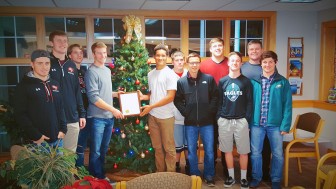 Members of the 2015 Saucon Valley football team were recipients of a resolution passed in their honor Wednesday by Lower Saucon Township Council. Pictured holding the resolution are senior quarterback Zach Thatcher and senior running back Evan Culver.