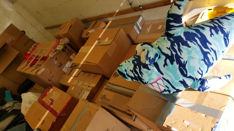 The floor of a 16-foot box truck was filled with boxes of toys donated for Toys for Tots.