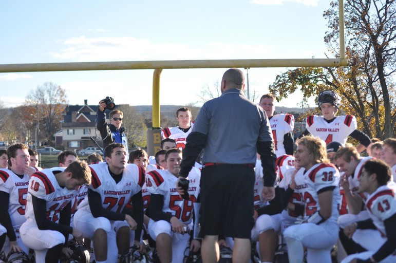 Proud Panther, Coach Evancho, addresses his team after the victory against BECA