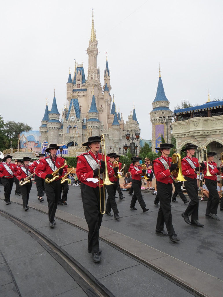 The Saucon Valley High School Marching Band marches down Main Street, U.S.A. in front of Cinderella's Castle at Disneyworld.