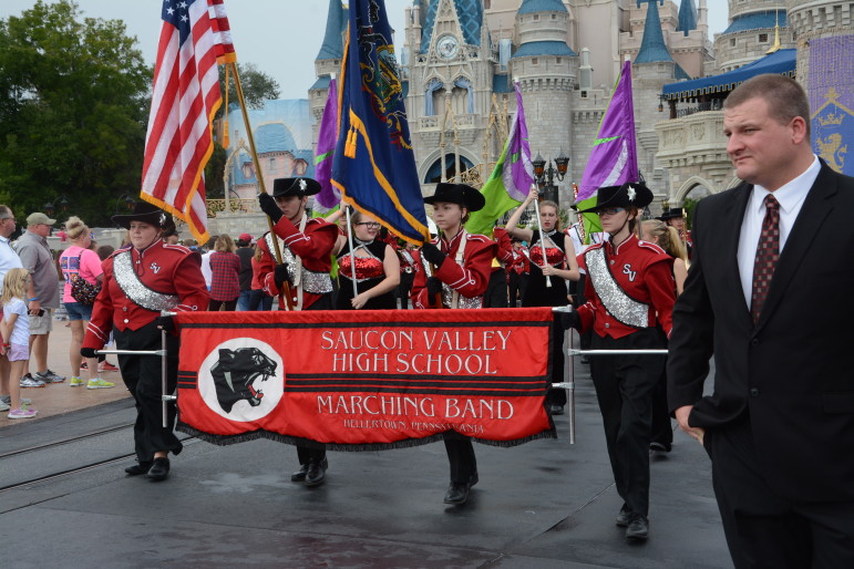 The Saucon Valley High School Marching Band parades in front of Cinderella's Castle at Disneyworld in Florida.
