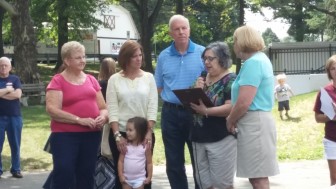 Part of the annual Hellertown-Lower Saucon Community Day celebration involves recognizing and honoring well-established local businesses. Pictured: The owners of the former Klassic Gold jewelry store in Hellertown--Lynn Kemmerer and Denise Knauss--are recognized by Lower Saucon Township council members David Willard and Priscilla deLeon for their contributions at Community Day in 2014. They are joined by employee Janice Fluck.