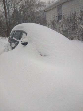 A car is buried by the snow that fell in the Saucon Valley during the blizzard of Jan. 23, 2016.