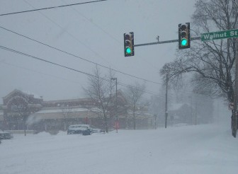 The normally busy intersection of Walnut and Main streets in Hellertown is deserted as heavy snow falls throughout the borough, which is now under a blizzard warning issued by the National Weather Service.