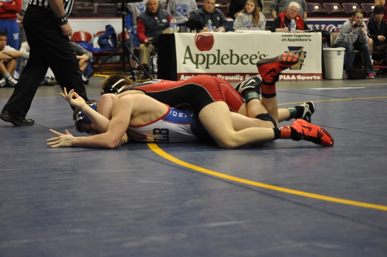 Yonney gets a takedown along the way to his 100th win