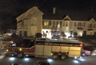 A Se-Wy-Co Fire Co. truck is parked outside the scene of a fatal fire in the Society Hill development in Lower Saucon Township Thursday.