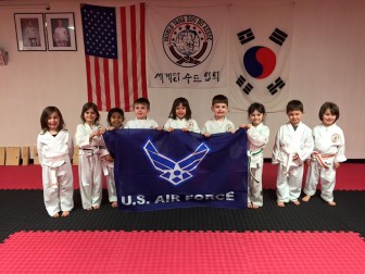 Several of Saucon Valley Karate Academy's classes recently posed for photos with the U.S. Air Force banner for Geiter's daughter, who is currently studying at the Air Force Academy.