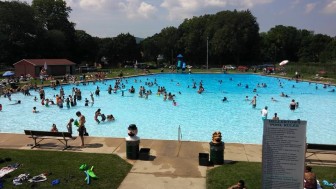 The Hellertown Pool is crowded on one of the hottest days of the summer, when the heat index topped 100 degrees.