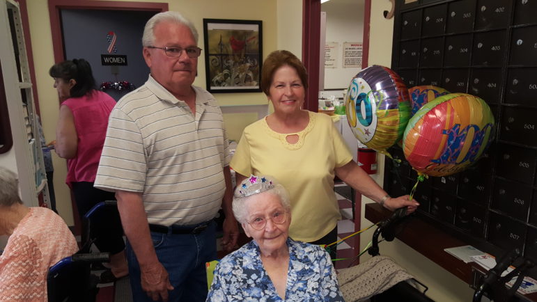 Edith Muldowney of Saucon Manor, Hellertown, was joined by her son Larry and her daughter Doris Moser at a surprise birthday party the other residents of the senior high-rise threw for her Thursday.