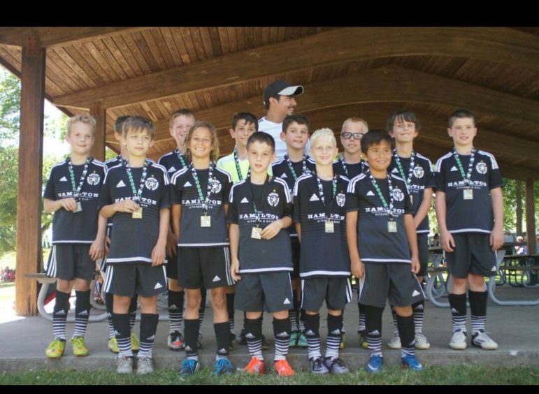 The Lehigh Valley United team and Coach Devia after winning the Lehigh Valley Tournament (contributed photo).