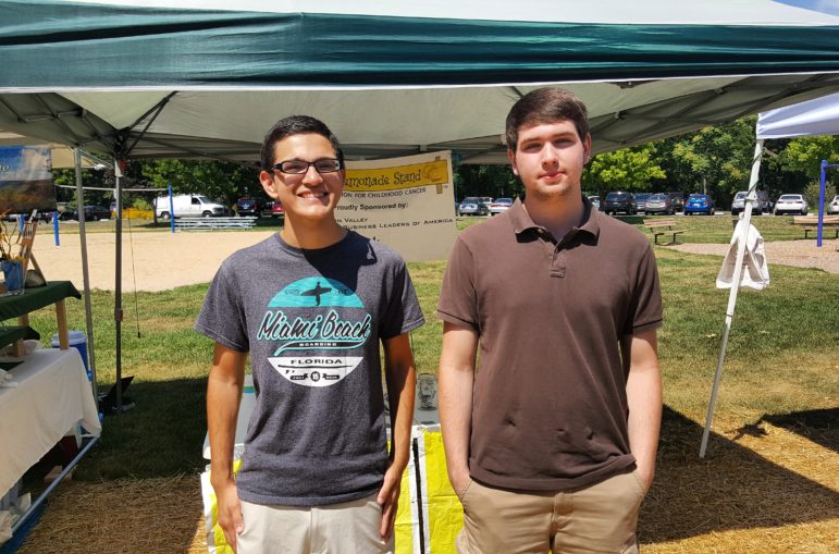 Kiran Pandey, left, and Jonah Beers are members of the Saucon Valley High School Future Business Leaders of America (FBLA) chapter. FBLA members are operating an Alex's Lemonade Stand at the Saucon Valley Farmers' Market through late August to help raise money for the fight against pediatric cancer.