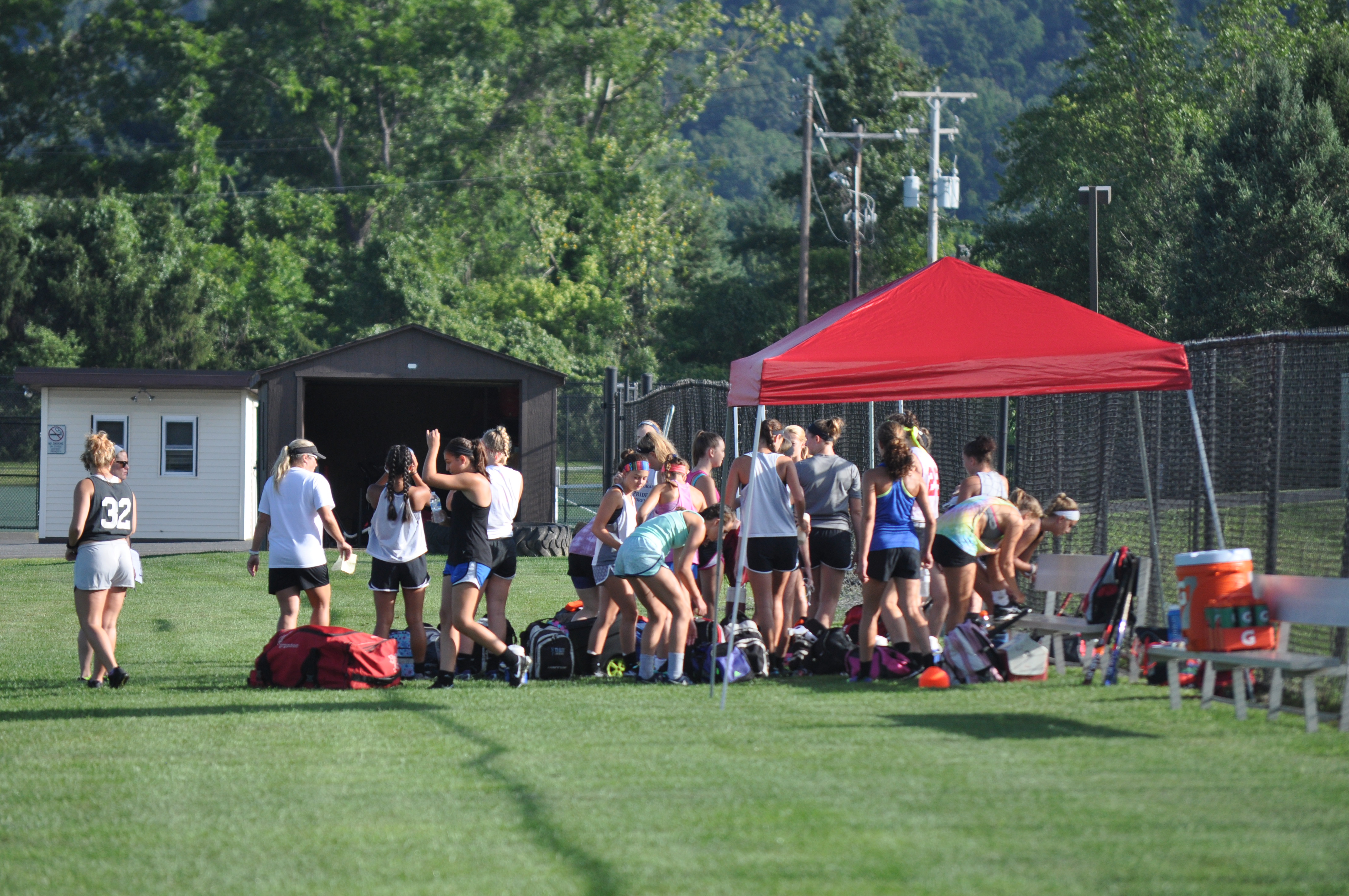 "Chicks with sticks" getting a water break before a little track work.