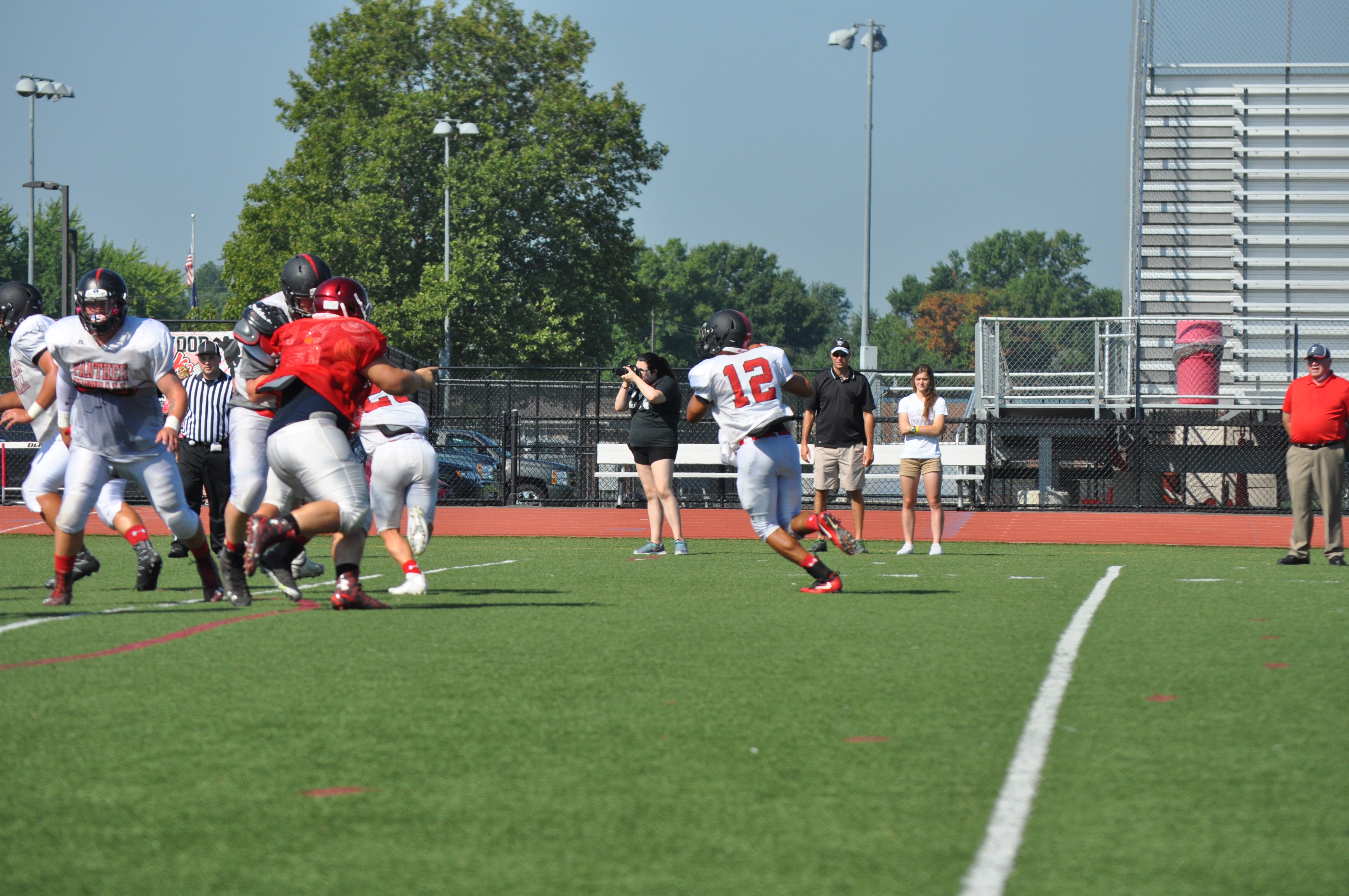 Saucon Valley Quarterback Brandon Holub rolls right looking for an open receiver during the Panther's scrimmage with Fleetwood on Saturday. 