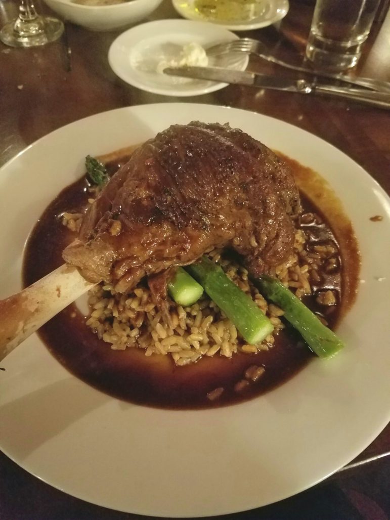 Braised Lamb Shank with a rosemary red wine sauce and mushroom risotto ($25.50)