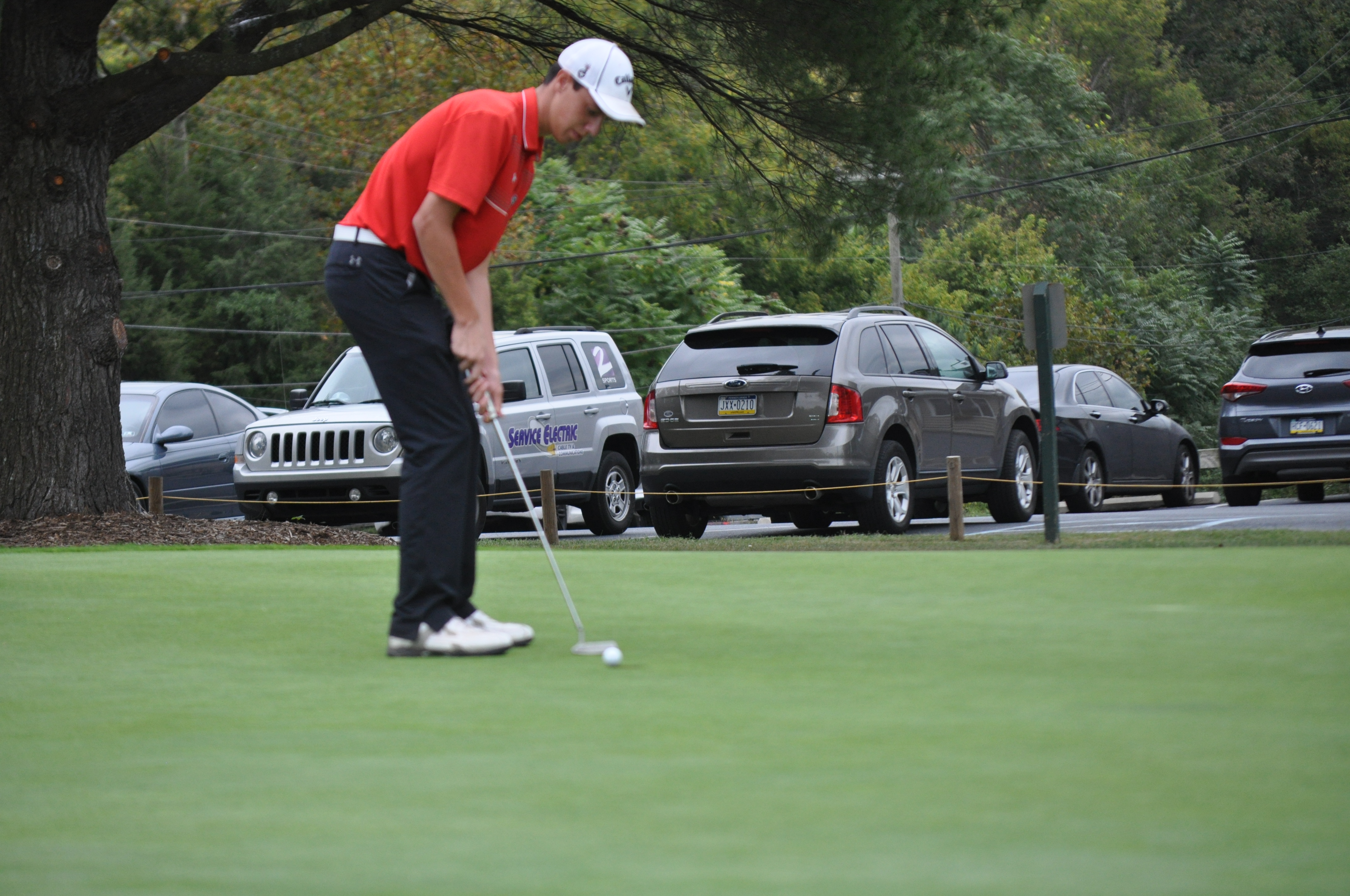 Saucon senior Thomas Coakley putting on the 18th hole at the Bethlehem Golf Club in the Colonial League championship.