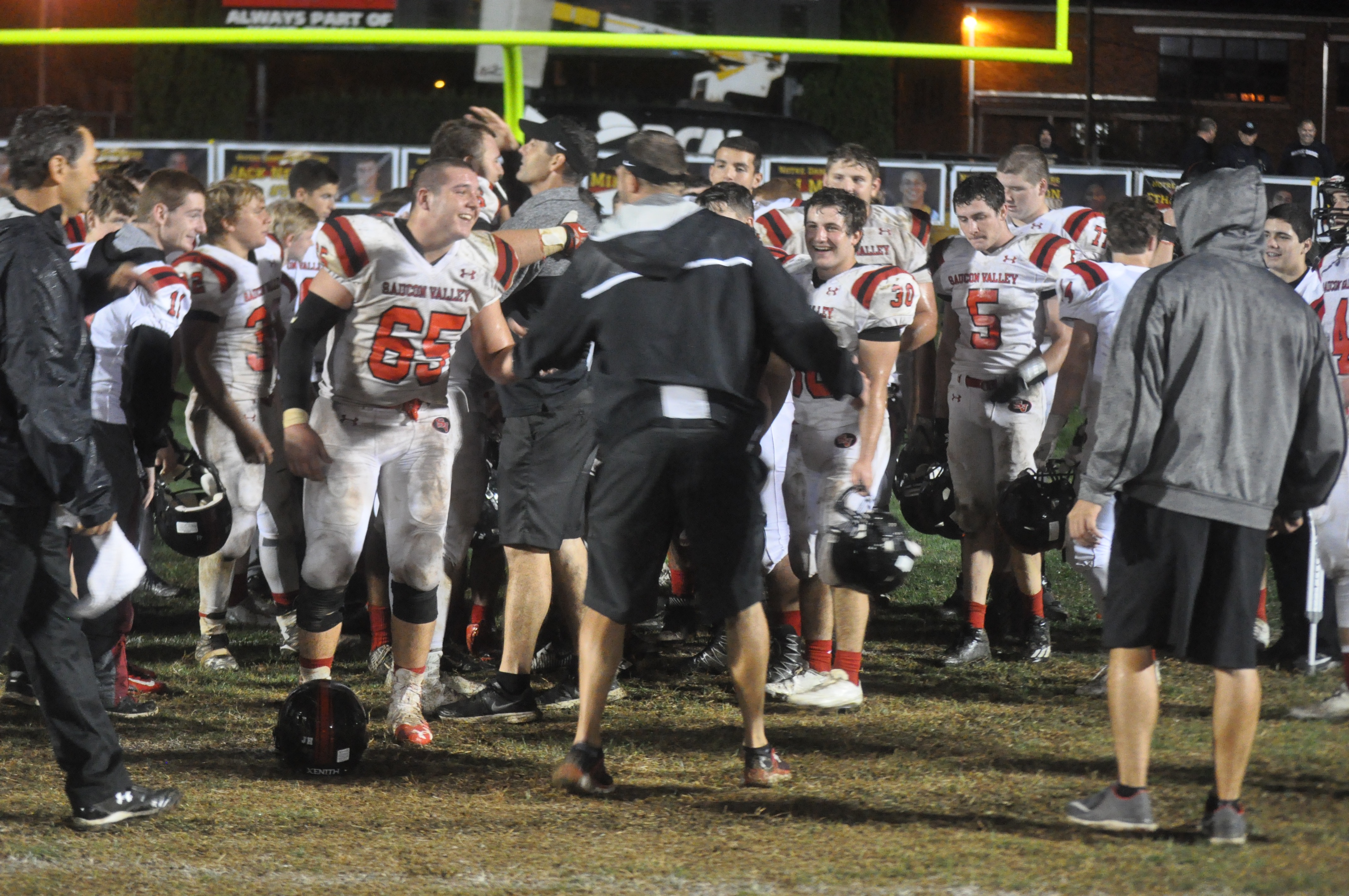 Coach Sams celebrates the victory with his troops.