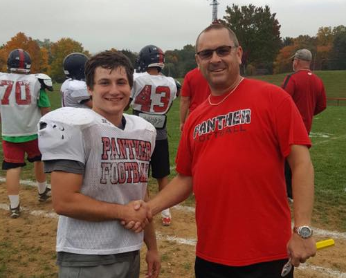 Dino Zaharakis is congratulated on his Week 6 Kerry's Krunch award by "Krunchmeister" Kerry Kemmerer.