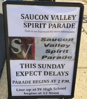 This sign advertising the 2016 Saucon Valley Spirit Parade is on display outside Advanced Optics, near the northern end of the parade's Main Street route.