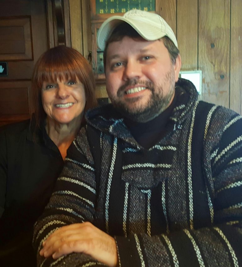 Longtime Crossroads server Kathy Lichtenwalner of Hellertown celebrates being back at work with Saucon Source publisher Josh Popichak