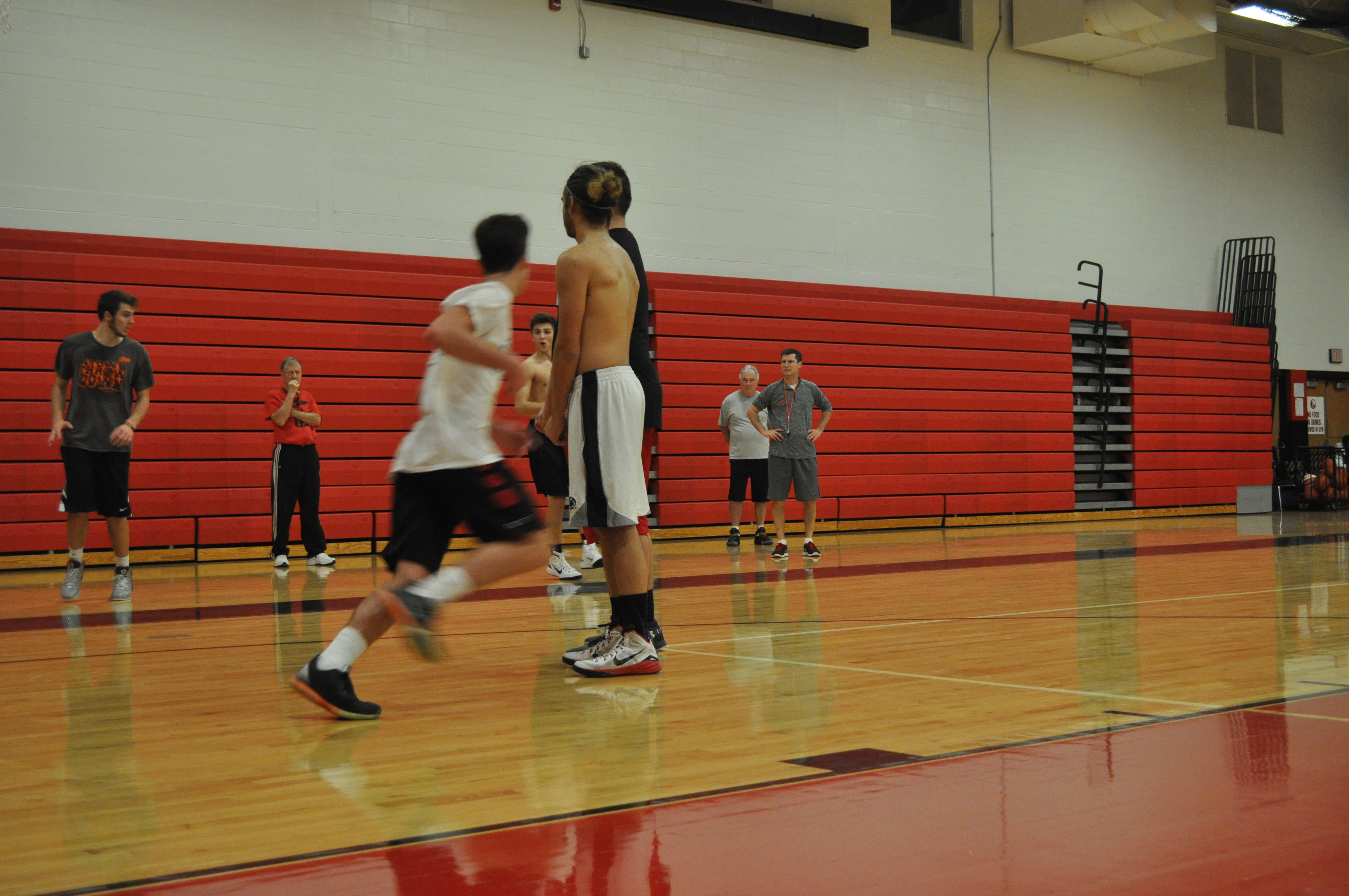 SV basketball coach Matt Brown making sure the double screen is set properly.