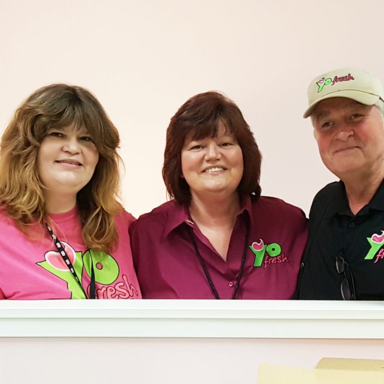 From left, YoFresh store manager Lisa Jones and owners Donna and Paul Novak.