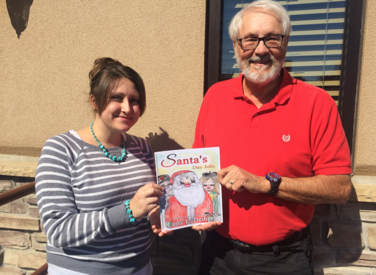 Hellertown author Larry Deibert and freelance artist/illustrator Ashley Reigle of Center Valley partnered to create "Santa's Day Jobs," a children's story and coloring book that was recently published.