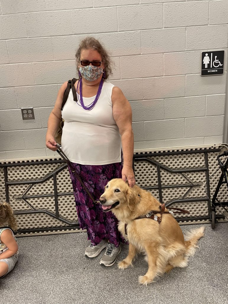 Debbie with her Seeing Eye dog, Virgil, at the Lower Saucon Fire Rescue Leithsville station.