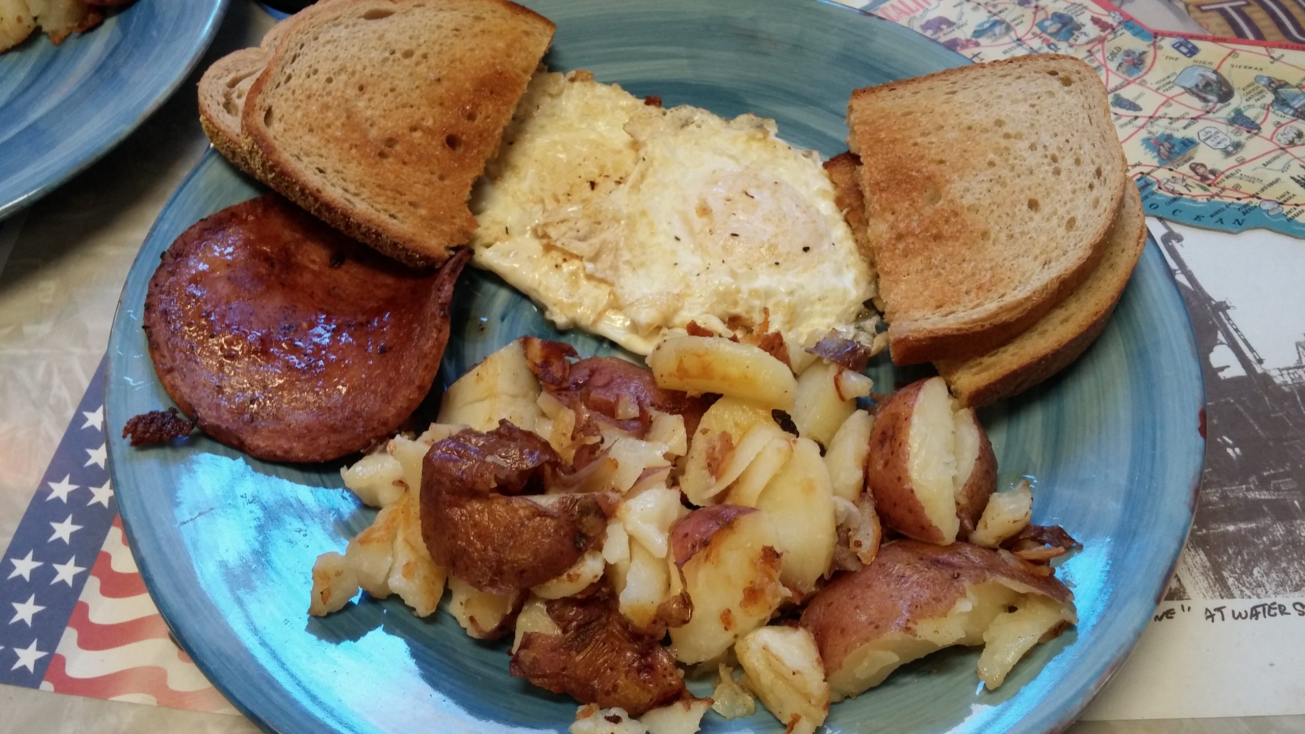 Breakfast at Bergy's: Toast, eggs over easy, home fries and pork roll.