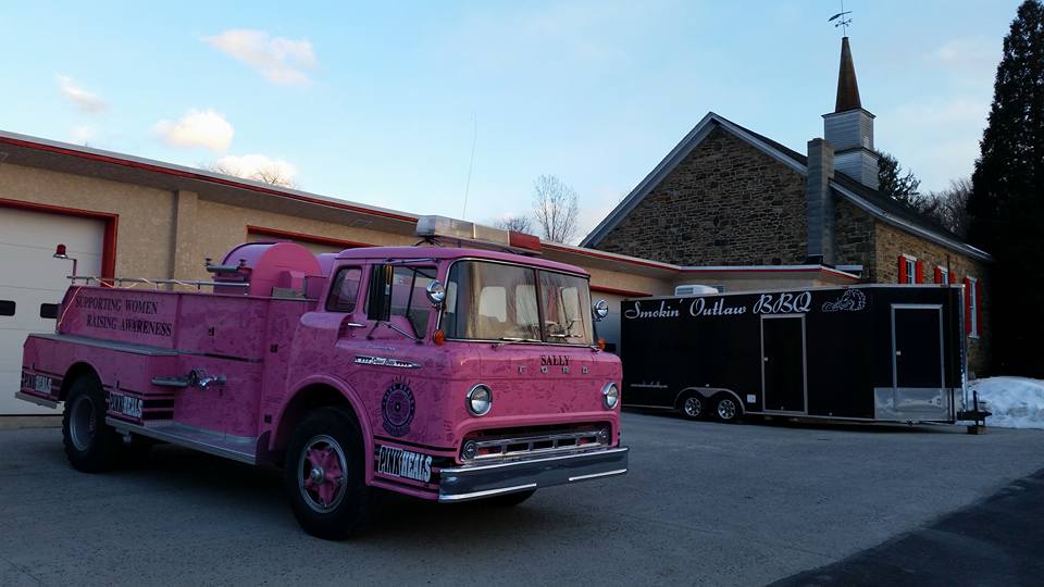 The Pink Heals Lehigh Valley chapter's pink fire truck is parked outside Southeastern Volunteer Fire Co. in Lower Saucon Township for Smokin' Outlaw BBQ's 4th annual 'Movin' & Groovin' to the 60s and 70s' fundraiser event.