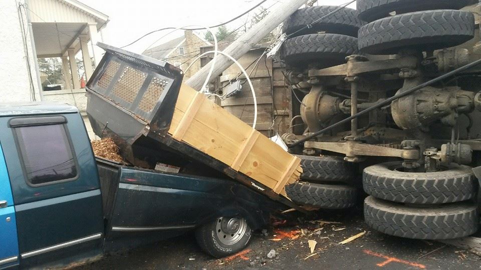 A pickup truck parked in front of the Leithsville fire station in Lower Saucon Township was damaged when a garbage truck crashed into it Tuesday morning. Township police said the crash happened after the truck's brakes failed on Flint Hill.