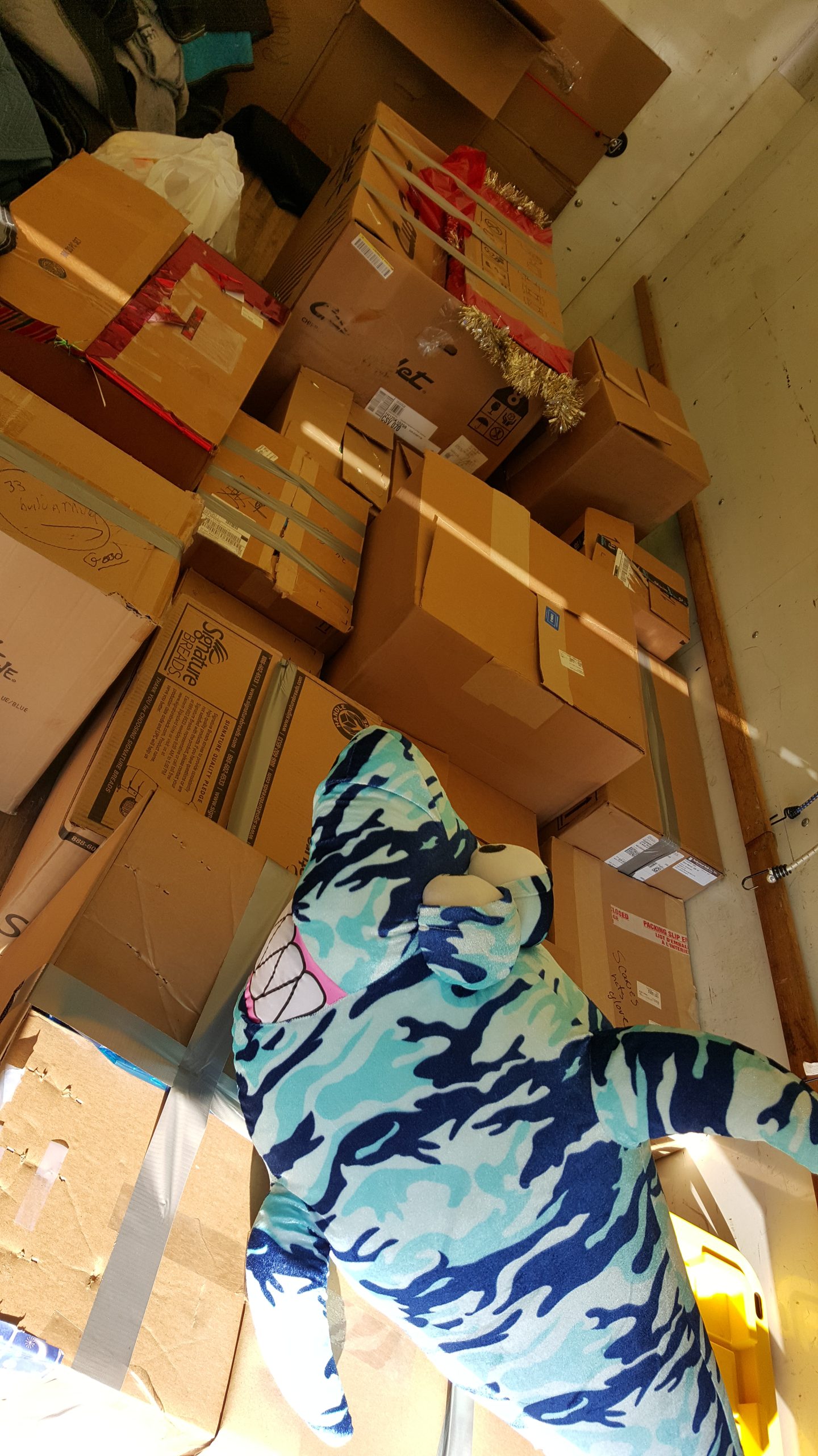 The floor of a 16-foot box truck was filled with boxes of toys donated for Toys for Tots.