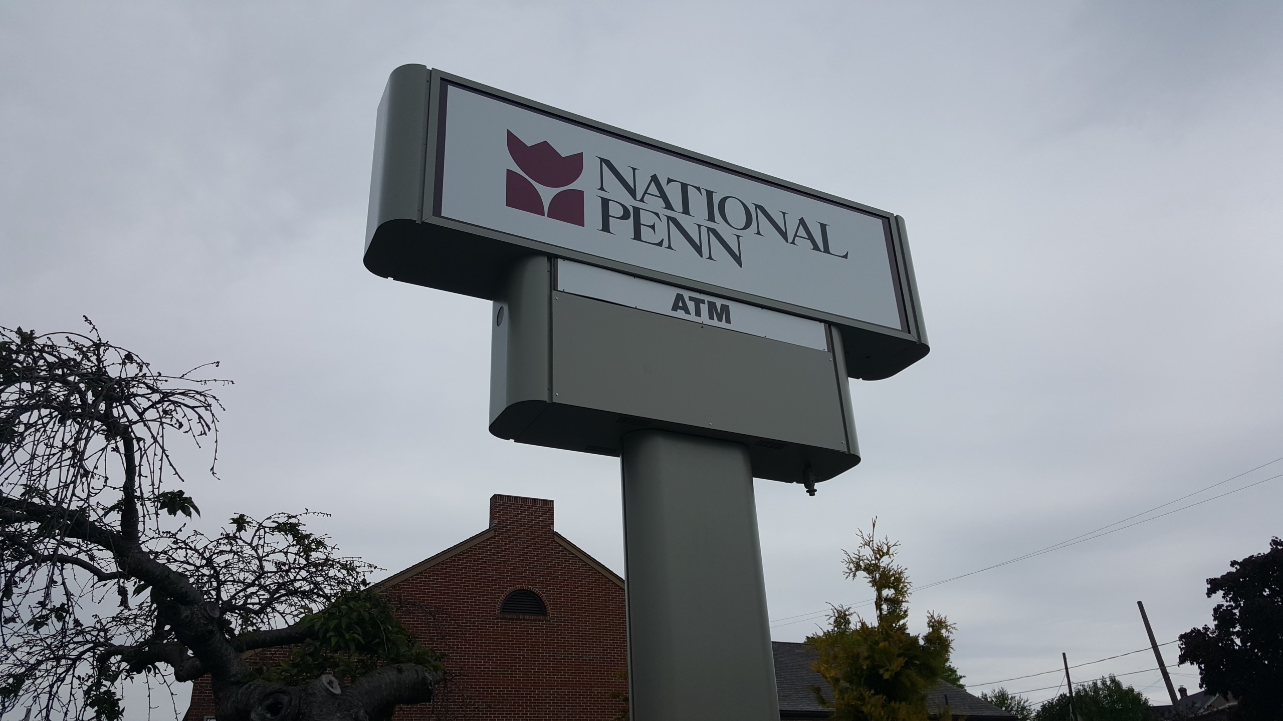 The electronic time and temperature display on the National Penn Bank sign at the Hellertown branch has been covered over.