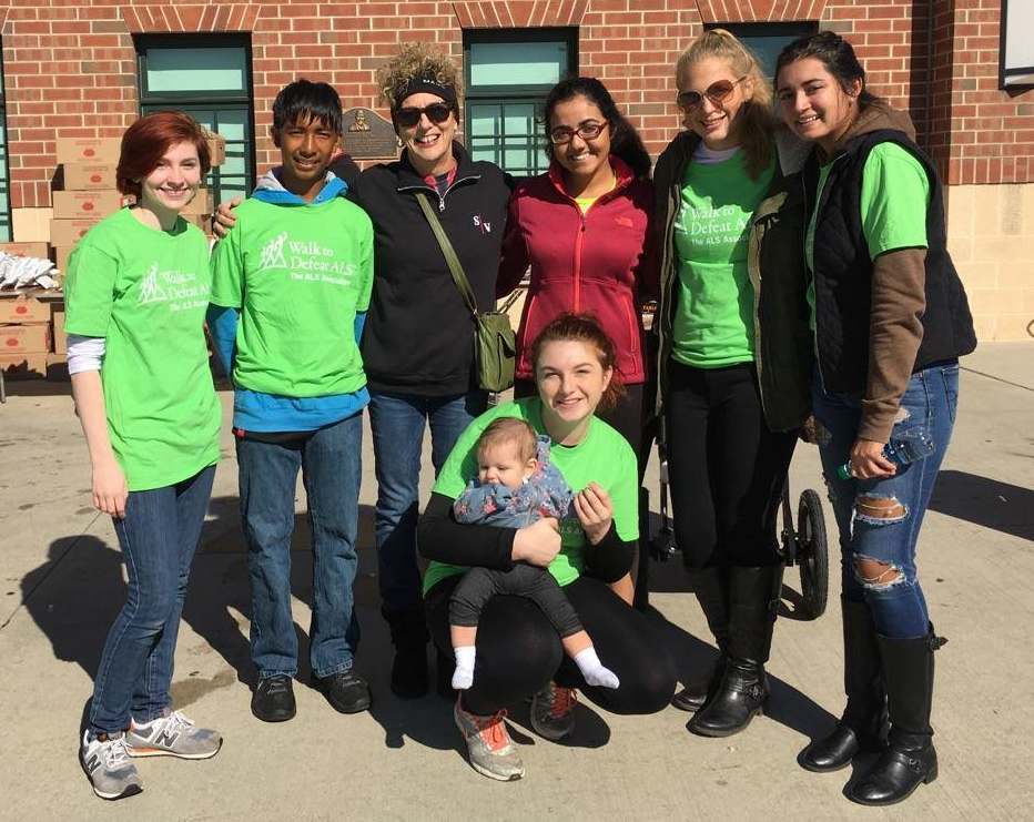 From left to right: Emileigh Keeler, Cooper Weber, Genia Miller, Malaika Nehal, Helen Cordes, Daniela Sanchez, Taylor Geiger (kneeling with Miller's granddaughter Evie) at the 2016 Lehigh Valley Walk to Defeat ALS in Allentown Saturday